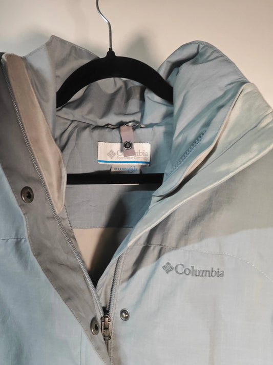 Veste Columbia homme bleu-gris de Columbia, avec fermeture éclair et boutons-pression.