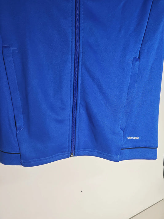 Veste de survêtement bleue Adidas Climalite pour enfant, avec fermeture éclair et poches.