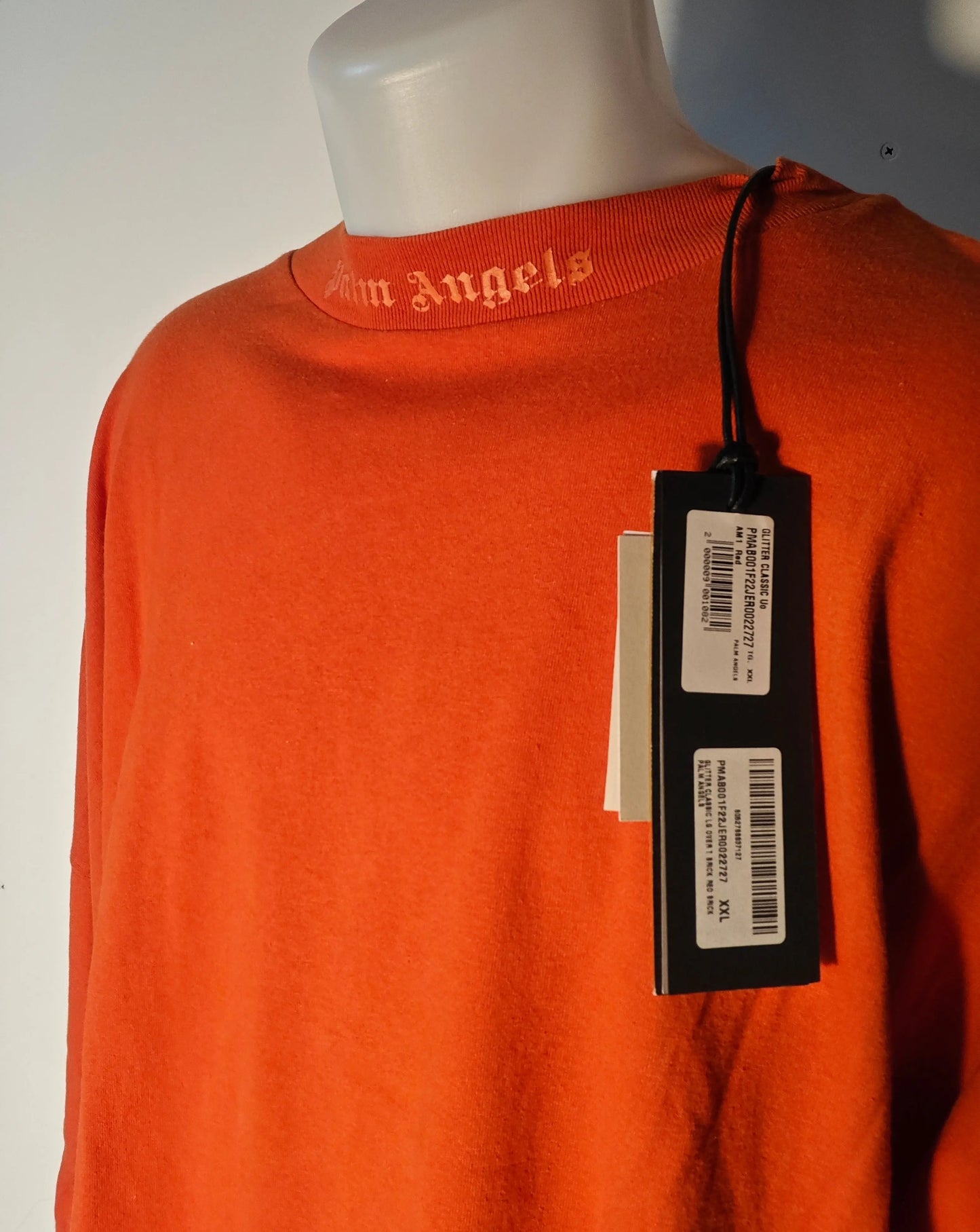 T-shirt oversize orange par Palm Angels, avec un col ras du cou orné du logo de la marque.
