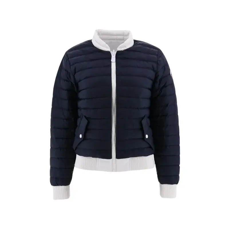 Doudoune bleu marine pour femme de Jott, avec détails blancs au col, à la taille et aux poignets.