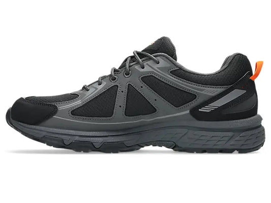 Chaussure de trail noire et grise Asics Gel-Venture 6 GTX par Asics, vue de côté, avec accents orange à l'arrière.
