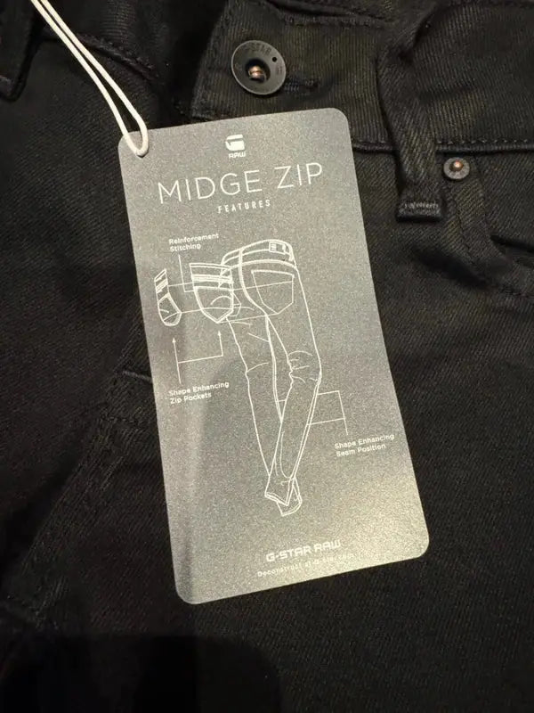 Jean skinny noir G-Star RAW, avec étiquette descriptive des caractéristiques de la coupe.

