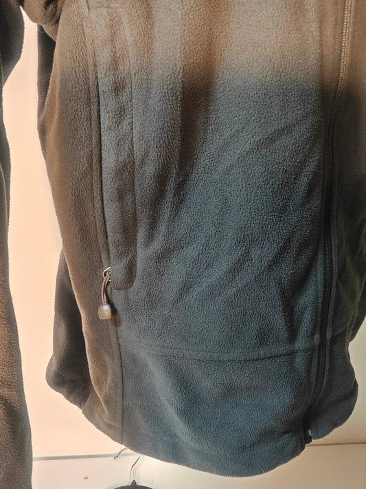 Polaire homme noire Windwall de The North Face, avec fermeture éclair et poche latérale zippée.