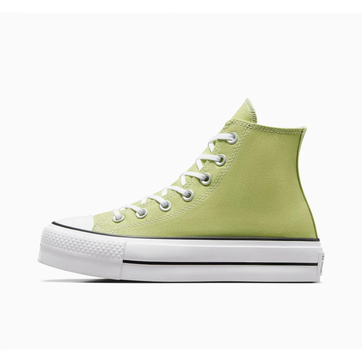 Baskets montantes vert vitalité Chuck Taylor All Star Lift de Converse, avec semelle plateforme blanche à rayures noires.