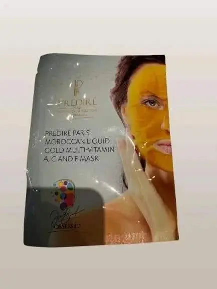 Masque de visage doré par Prédiré Paris, avec une image d'une femme portant le masque.